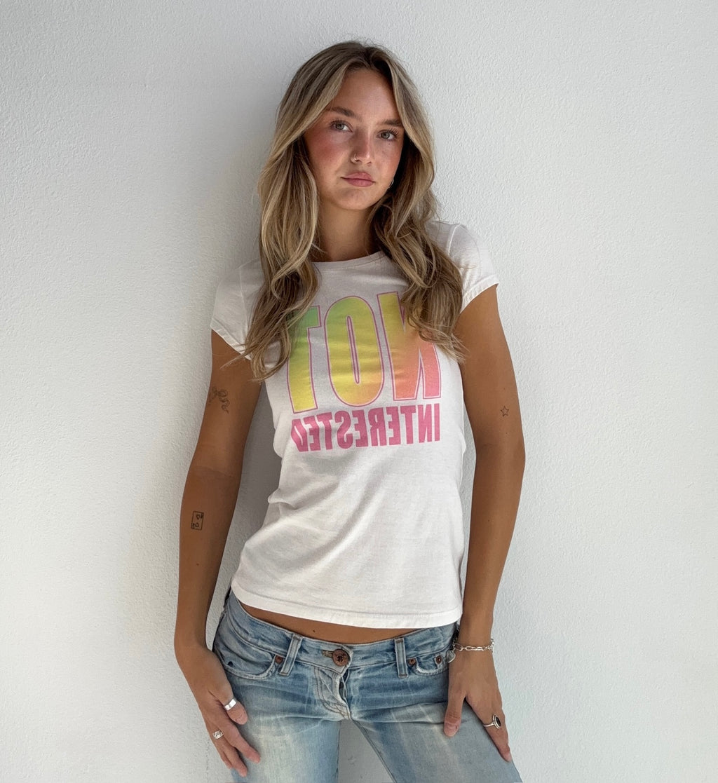 “Not Interested” Graphic Baby Tee (Small)